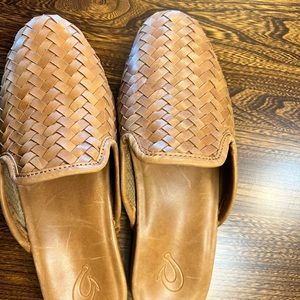Brown weave olukai slides